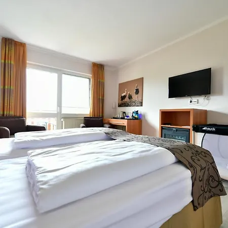 - & Hotel